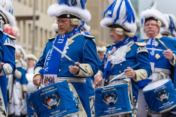 The Kölner Funken Artillerie marches in its traditional costumes at the Rose Monday Parade during Carnival in Cologne, Germany