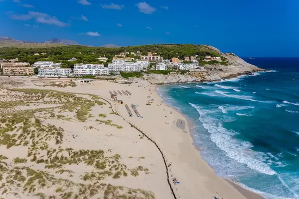 The long beach of Cala Mesquida on the northeast coast of Mallorca, near Capdepera. Drone photo