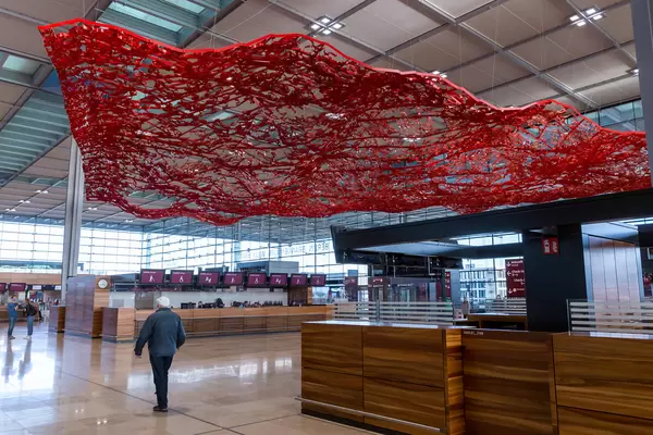 The magic carpet: artwork by Californian artist Pae White hangs from the ceiling of the BER check-in hall