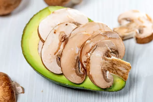 The mushroom pieces fresh avocado - preparing to bake (Flip 2019)