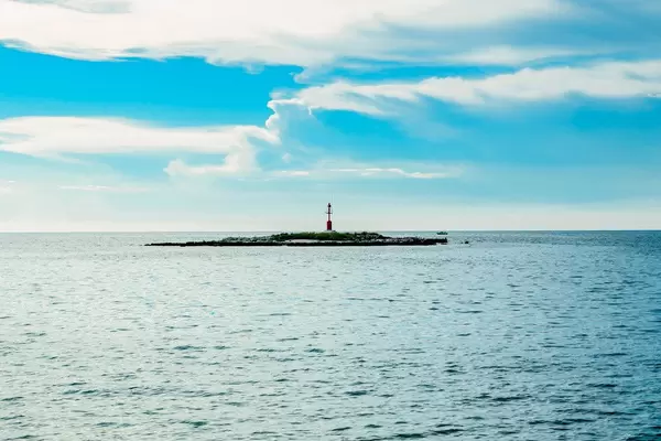 The old lighthouse on the beautiful seashore coast