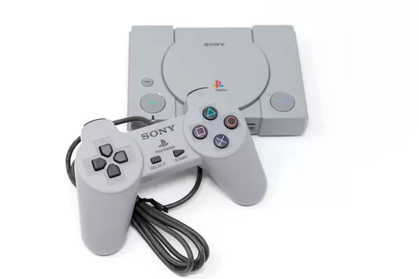 The Playstation Classic mini console on white background