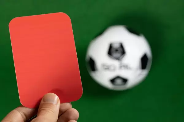 The referee in red card gesture