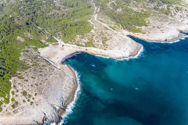 The sandy coves of Cala Mitjana and Cala Estreta near Artà on Mallorca. Drone photo