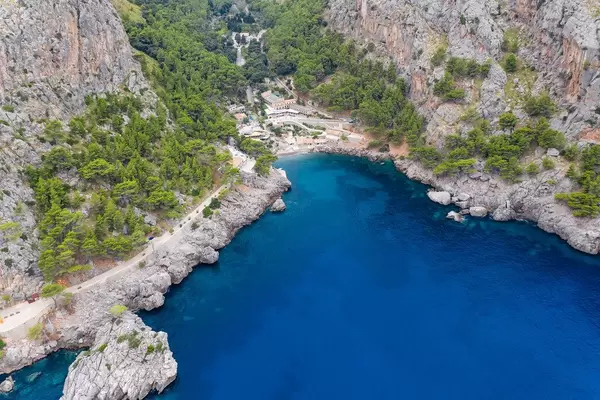 The small village and the bay of Sa Calobra on the north-west coast of Majorca. Drone photo
