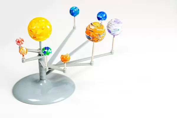 The sun and planets of the solar system on a white background