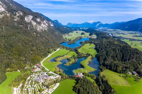 The three swimming lakes near Kramsach in Tyrol, Austria: Lake Reintal, Buchsee, Krummsee. Drone pic