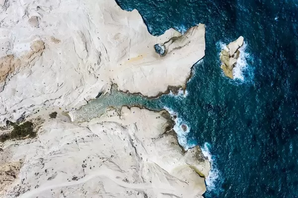 The unique landscape of Sarakiniko seen from the air. The volcanic north coast of Milos