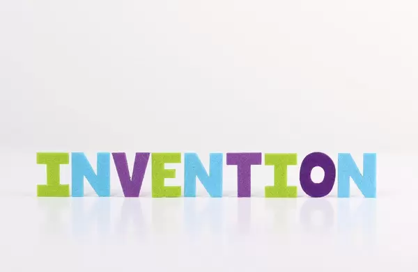 The word Invention on white background