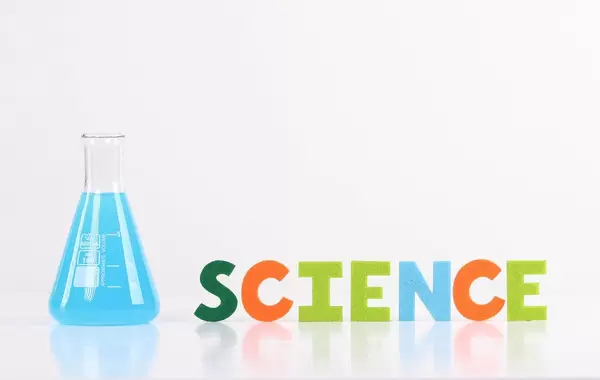 The word Science with laboratory flask on white background