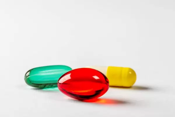 Three treatment capsules close-up