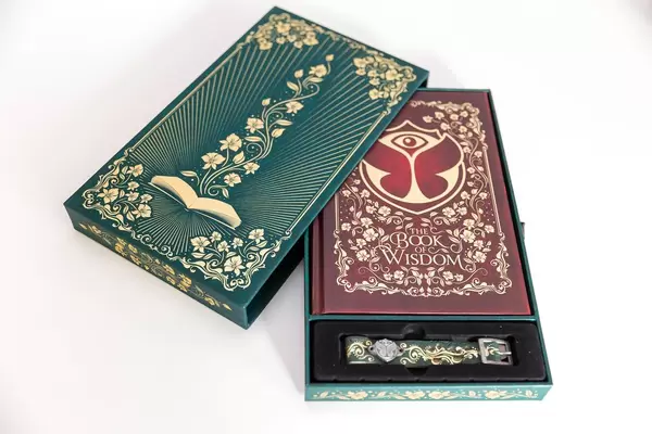 Ticket package for the Tomorrowland Festival 2019, with the Book of Wisdom and the Festival bracelet