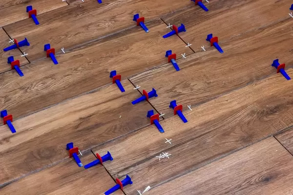 Tile leveling system during laying