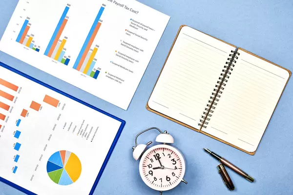 Time to pay taxes. Business documents with graphs and charts