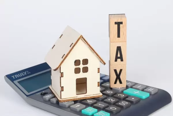 Tiny house and Tax text with calculator