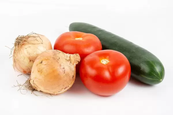 Tomato Cucumber and Onions on the white background (Flip 2019)