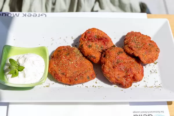 Tomato "keftes" with spring onions, fresh herbs and feta cheese at Aelia Restaurant Kassandra