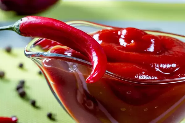 Tomato sauce with chili pepper close-up