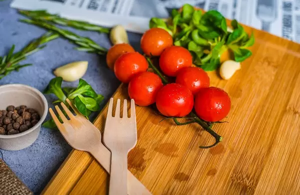 Tomatoes on wooden Plate