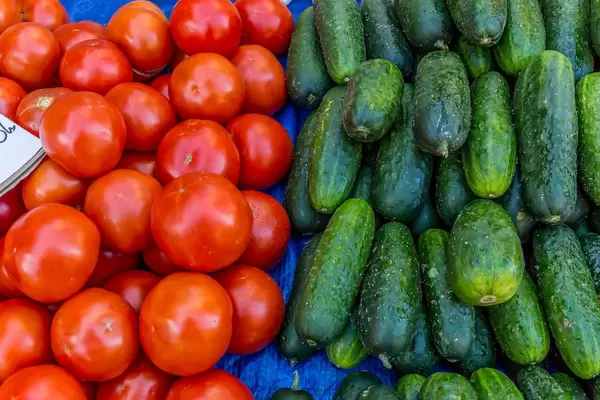 Tomatos and cucumbers on marketplace