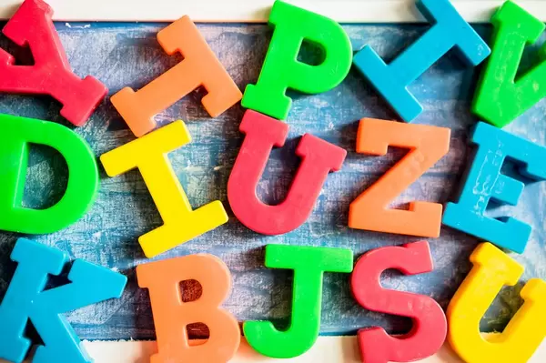 Top-down of different color letters