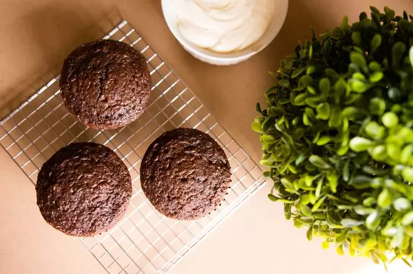 Top-down of three chocolate cupcakes