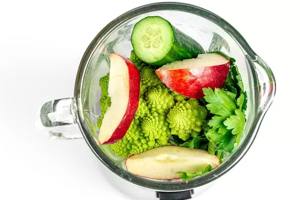 Top view , blender with fresh vegetables and fruit. The concept of cooking healthy food (Flip 2020)