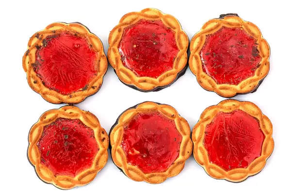 Top view, cookies with chocolate and fruit jelly