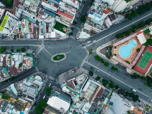 Top View Drone Photo of light Traffic in Phu Dong Roundabout with 6 exits at New World Saigon in Ho chi Minh City, Vietnam