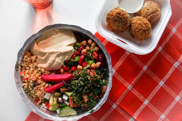 Top View Food Photo of Lebanese Couscous, Hummus, Falafel and Beans