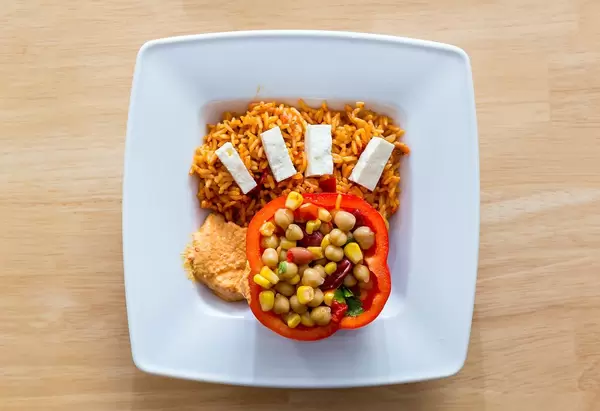 Top View Food Photo of Mexican Style Rice, Bell Pepper filled with Beans, Lentils and Corn