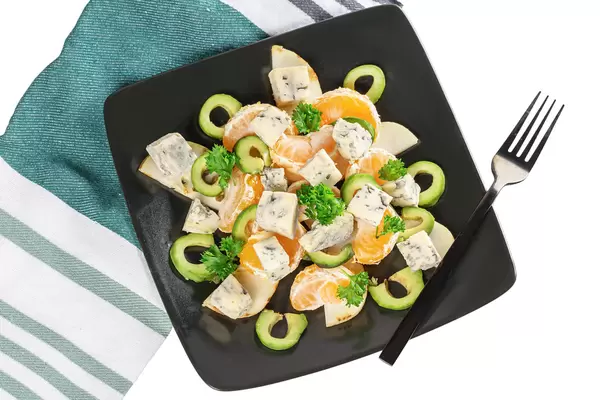 Top view, fresh fruit salad with dor blue cheese