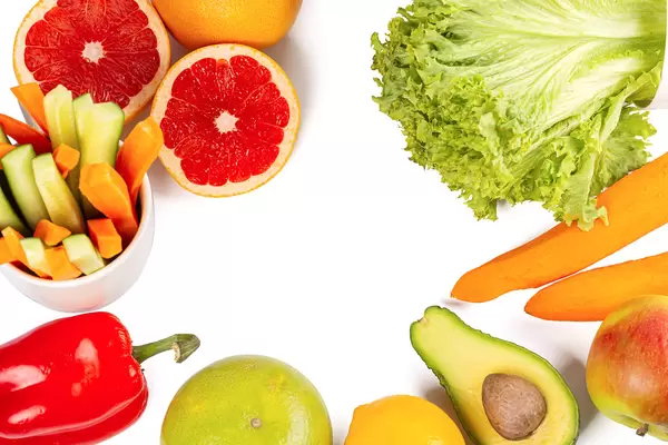 Top view, fresh vegetables and fruits on white