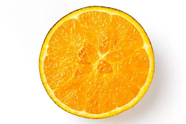 Top view, half of a chocolate orange on a white background