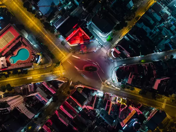 Top View Long Exposure Drone Photo of Phu Dong Six Way Intersection in District 1 in Ho Chi Minh City, Vietnam