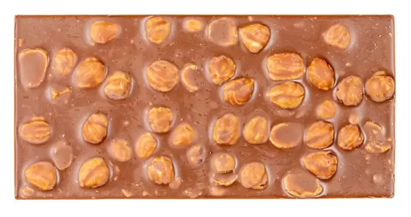 Top view, milk chocolate bar with whole hazelnut nuts (Flip 2020)