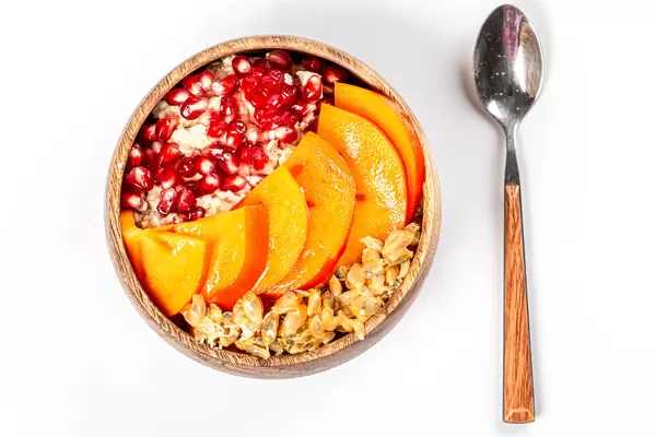 Top view, oatmeal with fresh fruit