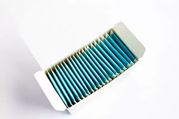 Top view of a pack of tea on white background