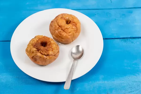 Top view of Baked Apples served on the plate (Flip 2020)