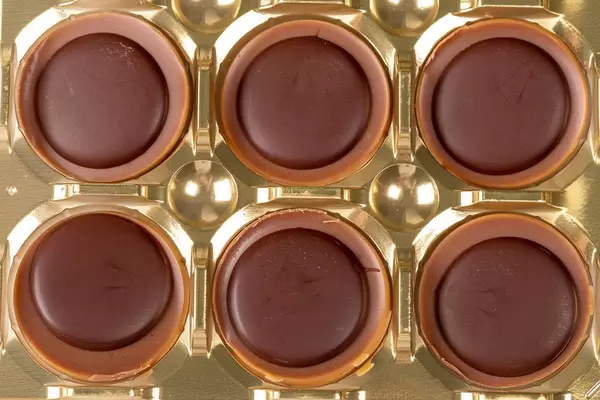 Top view of caramel and chocolate candies (Flip 2020)