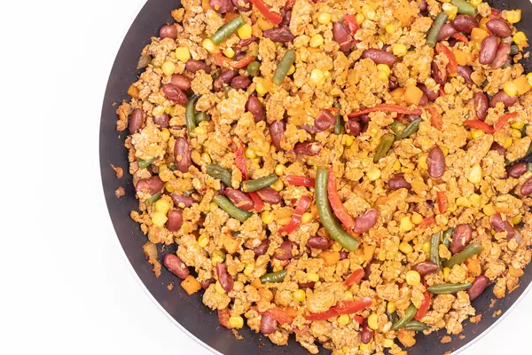 Top view of Fried Minced Meat with Vegetables in the frying pan