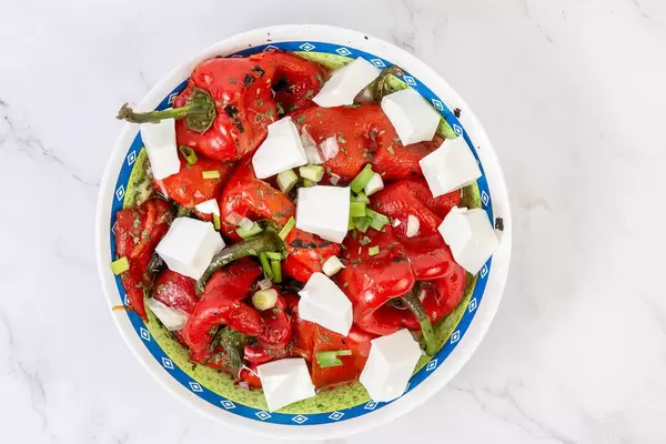 Top view of Fried Red Paprika and white Cheese (Flip 2019)