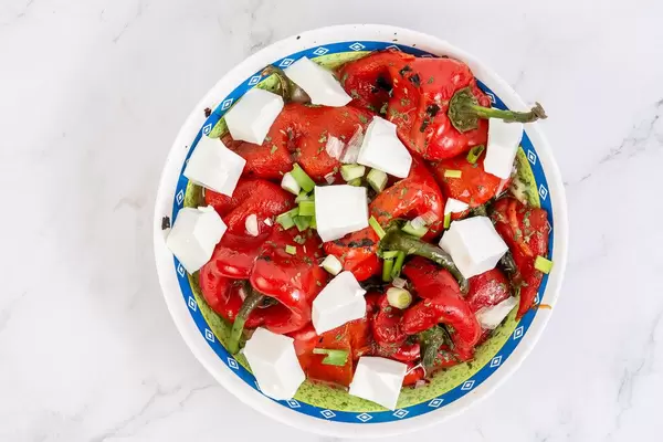 Top view of Fried Red Paprika and white Cheese