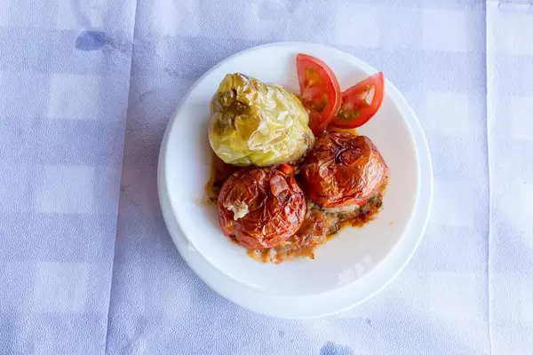Top view of Greek style stuffed tomatoes and peppers