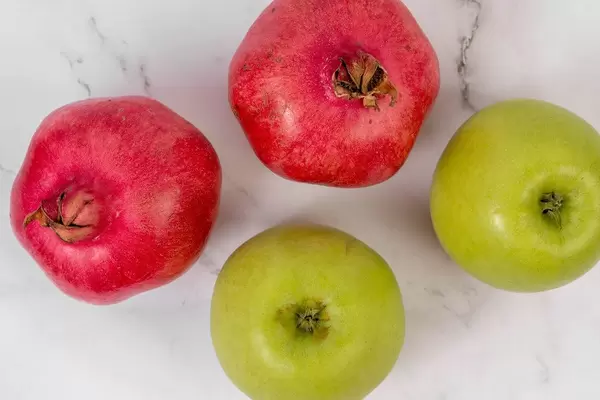 Top view of Green Apple and Pomegranate (Flip 2019)