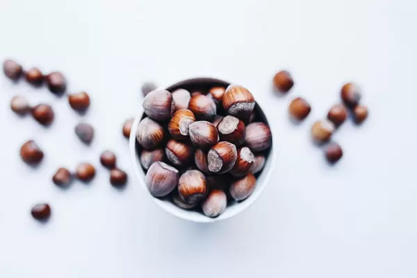 Top view of hazelnuts . Blurred hazelnuts in the background
