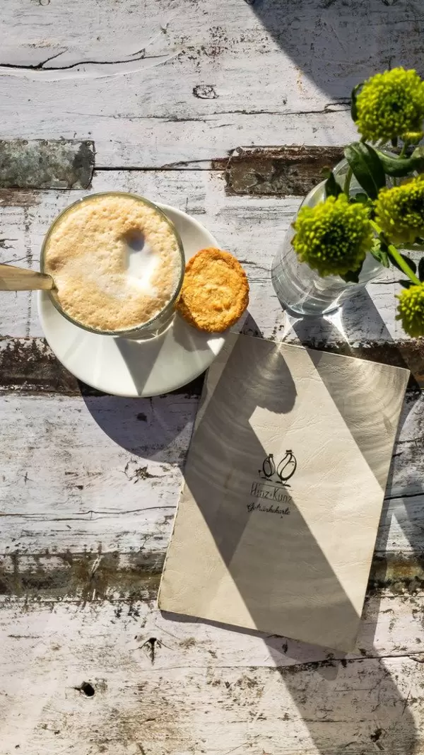 Top view of latte with biscuit