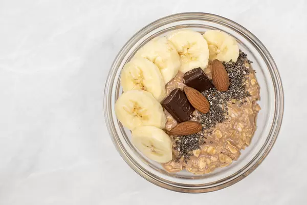 Top view of Oatmeal with Bananas Chocolate and Chia