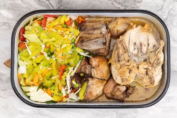 Top view of Pork Ribs and Chops with Vegetables