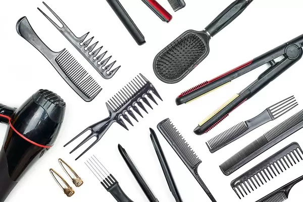 Top view of professional hairdresser set on white